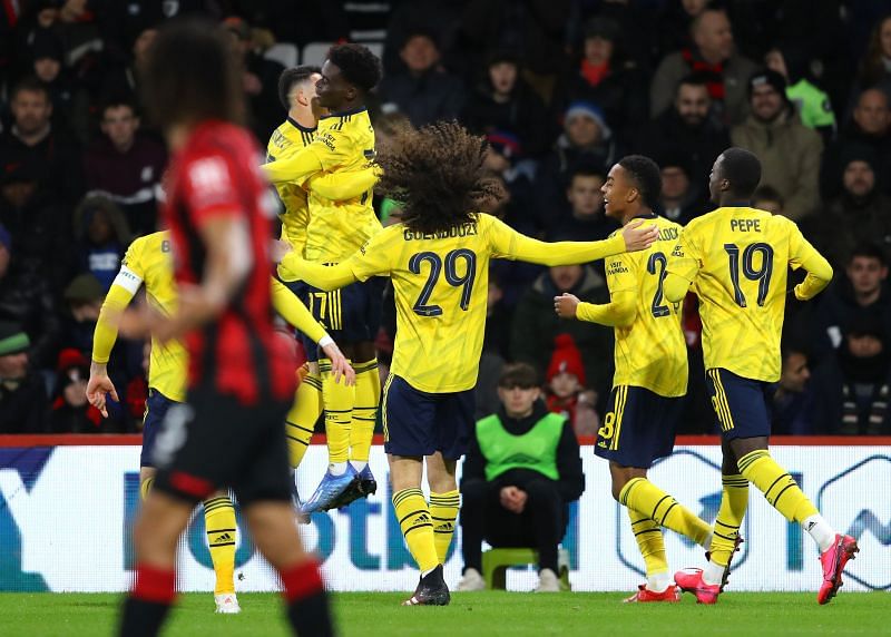 Saka celebrating his goal with provider Gabriel Martinelli